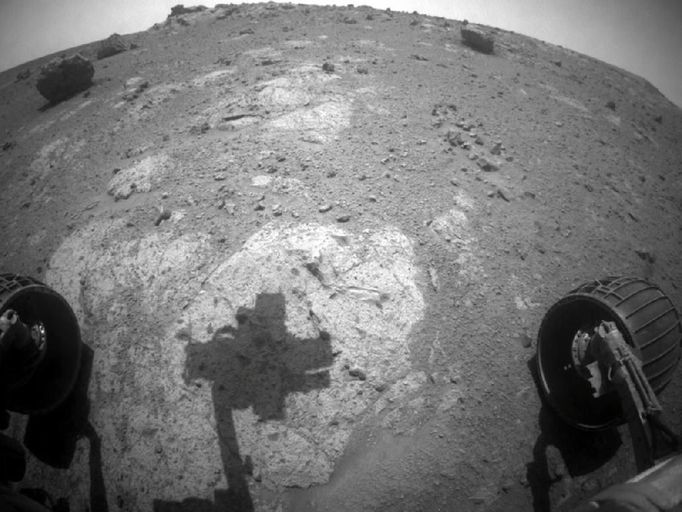 Shadow Across 'Chester Lake' on Endeavour Rim, Sol 2710 The robotic arm of NASA's Mars Exploration Rover Opportunity casts a shadow on a rock outcrop called "Chester Lake" in this image taken by the rover's front hazard-avoidance camera. The image was taken during the 2,710th Martian day, or sol, of Opportunity's work on Mars (Sept. 8, 2011). Chester Lake, an exposure of bedrock on the rim of Endeavour crater, is the second rock approached by Opportunity for close inspection since the rover arrived at Endeavour in August 2011 after a three-year trek. The rock is on a low ridge called "Cape York," which is a segment of the western rim of Endeavour crater. Endeavour is about 14 miles (22 kilometers) in diameter. Image credit: NASA/JPL-Caltech