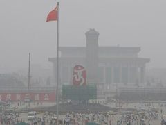 Smogem zahalený Peking před olympiádou
