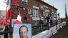 The house of Rocher, former mechanic and French Socialist party activist, poses is covered with posters and placards in support of Socialist party candidate Francois Hollande for the 2012 presidential election, in Ramousies