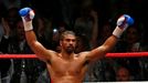 Britský boxer David Haye boxuje s Britem Dereckem Chisorou v mezinárodním mistrovství těžké váhy v londýnském Upton Parku v roce 2012.