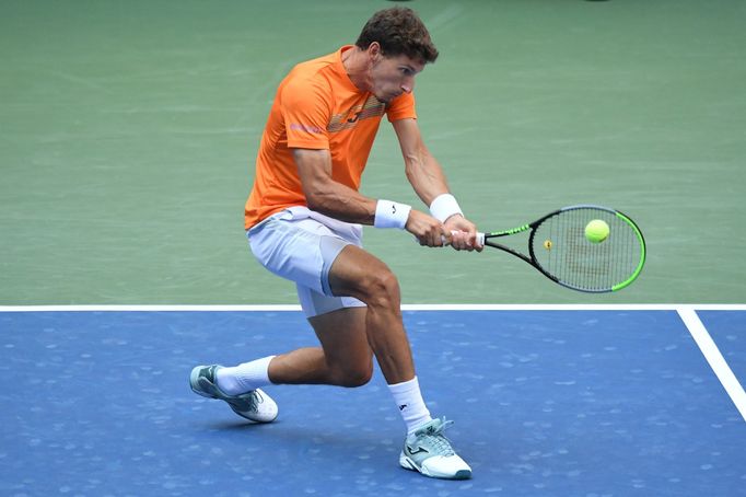 Sep 6, 2020; Flushing Meadows, New York, USA; Pablo Carreno Busta of Spain hits a backhand against Novak Djokovic of Serbia (not pictured) on day seven of the 2020 U.S. O