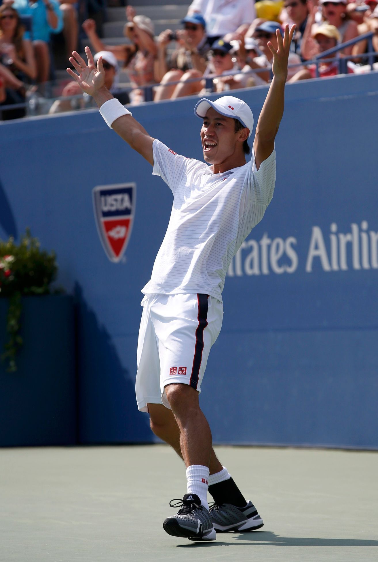 Kei Nišikori se raduje z postupu do finále US Open 2014