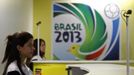 Workers attend the media presentation for FIFA Venue Ticket Centres in the six host cities of the FIFA Confederations Cup in Rio de Janeiro May 28, 2013. FIFA�s Marketing Director Thierry Weil showed how the ticketing pick-up will work and explained the ticket design and its special features. REUTERS/Pilar Olivares (BRAZIL - Tags: SPORT SOCCER) Published: Kvě. 28, 2013, 8:16 odp.