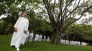 Buddhist nun walks in line with novice Thai nuns at the Sathira Dammasathan Buddhist meditation centre in Bangkok