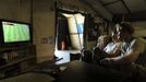 Britain's Prince Harry (R) plays a computer soccer game with fellow Apache pilot Captain Simon Beattie at Camp Bastion, southern Afghanistan in this photograph taken November 3, 2012, and released January 21, 2013. The Prince, who is serving as a pilot/gunner with 662 Squadron Army Air Corps, is on a posting to Afghanistan that runs from September 2012 to January 2013. Photograph taken November 3, 2012. REUTERS/John Stillwell/Pool (AFGHANISTAN - Tags: MILITARY POLITICS SOCIETY MEDIA ROYALS CONFLICT) Published: Led. 21, 2013, 7:46 odp.