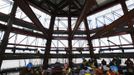 Iron workers gather to rest on a partially finished floor near the top of One World Trade Center in New York, April 30, 2012. The addition of iron columns to the 100th story pushed the height of One World Trade above that of the Empire State Building today. REUTERS/Lucas Jackson (UNITED STATES - Tags: CITYSPACE SOCIETY BUSINESS CONSTRUCTION) Published: Kvě. 1, 2012, 1:07 dop.