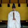 A Shinto priest conducts a ritual during ceremonies bidding farewell to 2014, ahead of New Year's Day, at the Meiji Shrine in Tokyo