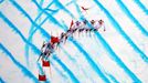 Ondrej Bank of the Czech Republic speeds down the course during the men's alpine skiing Super-G competition at the 2014 Sochi Winter Olympics at the Rosa Khutor Alpine Ce