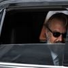 Kevin Costner looks out the window of his car as he arrives for the &quot;Black and White&quot; gala at the Toronto International Film Festival in Toronto