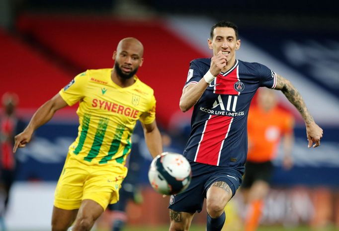 Soccer Football - Ligue 1 - Paris St Germain v Nantes - Parc des Princes, Paris, France - March 14, 2021 Paris St Germain's Angel Di Maria in action with Nantes' Marcus C