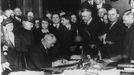 Governor James P. Goodrich of Indiana, surrounded by prominent "dry" workers, signing the state-wide prohibition bill to take effect April 2, 1918.