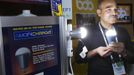 Founder Shailendra Suman poses with a SmartCharge LED lightbulb during &quot;CES Unveiled,&quot; a media preview event to the annual Consumer Electronics Show (CES), in L