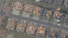 An aerial view of damage in a neighborhood in Moore, Oklahoma May 21, 2013, in the aftermath of a tornado which ravaged the suburb of Oklahoma City. Rescuers went building to building in search of victims and thousands of survivors were homeless on Tuesday, a day after a massive tornado tore through Moore, wiping out whole blocks of homes and killing at least 24 people. Seven children died at the school which took a direct hit in the deadliest tornado to hit the United States in two years. REUTERS/Rick Wilking (UNITED STATES - Tags: DISASTER) Published: Kvě. 21, 2013, 10:17 odp.