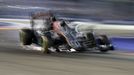 Force India Formula One driver Nico Hulkenberg of Germany collides with Williams Formula One driver Felipe Massa of Brazil during the Singapore F1 Grand Prix at the Marin