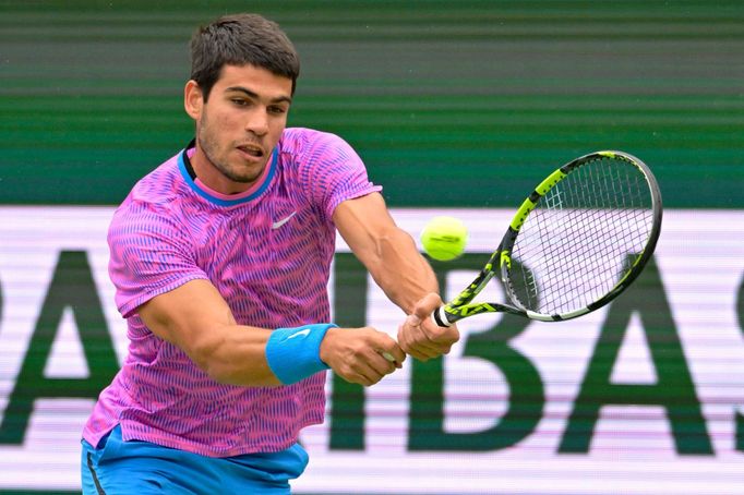 Mar 16, 2024; Indian Wells, CA, USA; Carlos Alcaraz (ESP) hits a shot in the semi-final match against Jannik Sinner (ITA) in the BNP Paribas Open at the Indian Wells Tenn