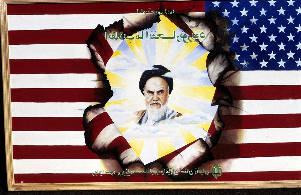 Khomeini and USA flag poster.
