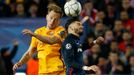 Atletico's Yannick Ferreira-Carrasco in action with Barcelona's Ivan Rakitic