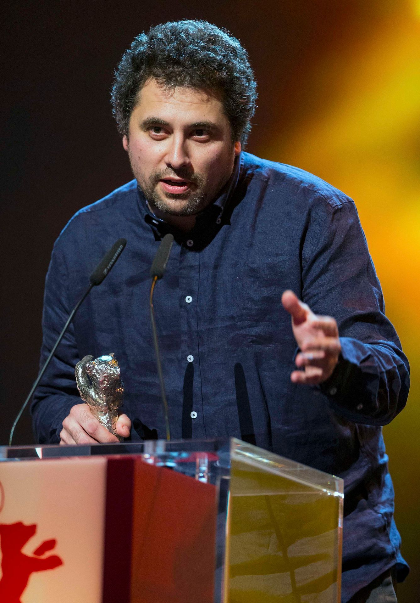 Jude speaks after receiving the Silver Bear for Best Director for the film 'Aferim' at the awards ceremony of the 65th Berlinale International Film Festival in Berlin