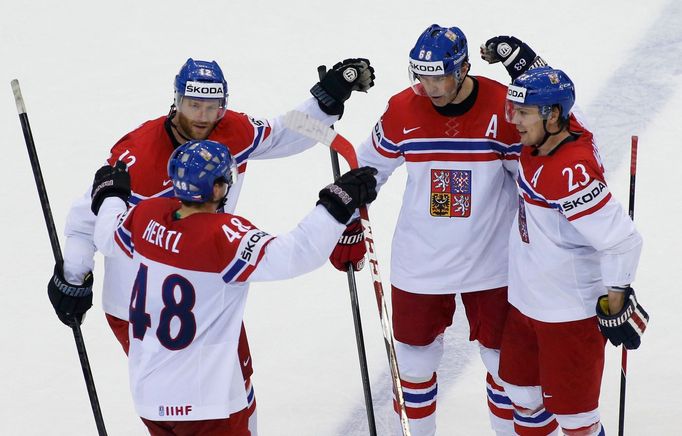 Ondrej Nemec of the Czech Republic (R) celebrates his goal against the U.S. with team mates during the second period in their men's ice hockey World Championship quarter-