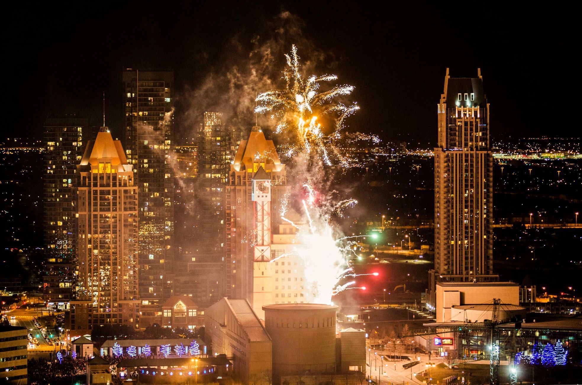 Fireworks explode over Celebration Square in front of City Hall to celebrate New Year's Day in Mississauga