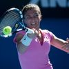 Sara Errani of Italy hits a return to Julia Goerges of Germany at the Australian Open 2014 tennis tournament in Melbourne