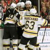Bruins Paille is mobbed by teammates after scoring in overti