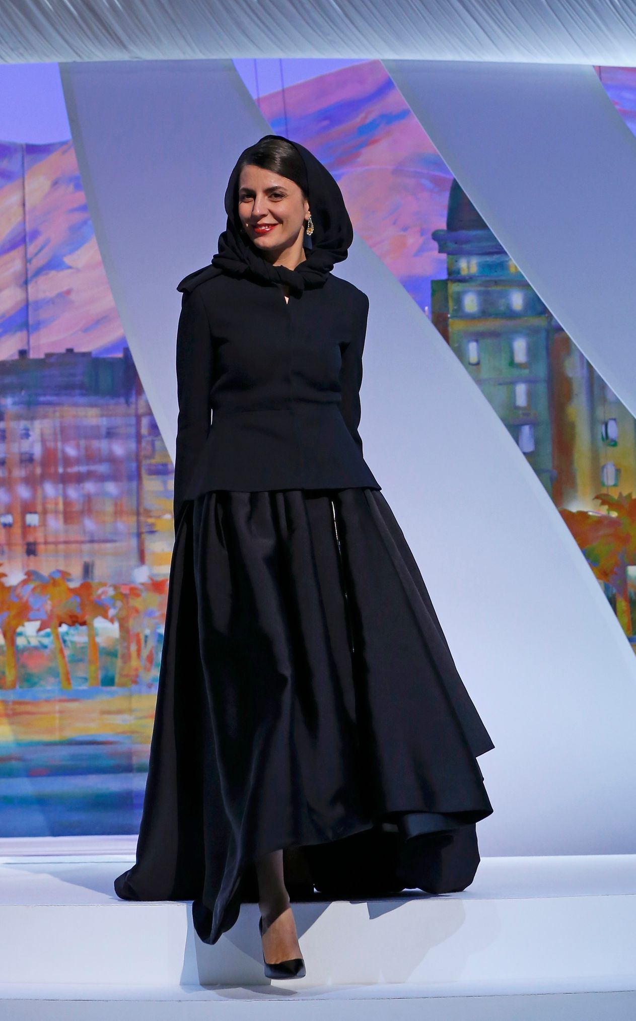 Jury member actress Leila Hatami walks on stage to attend the closing ceremony of the 67th Cannes Film Festival in Cannes