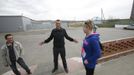 Former inmate Boris Kovalyov, 32, (C) talks to his wife Galina (R) and a relative after being released outside a high-security male prison camp outside Russia's Siberian city of Krasnoyarsk May 10, 2013. Kovalyov was sentenced to eight years in a high-security prison camp for drug trafficking, but was released two and a half years early, on May 10, 2013, for good behaviour and participation in sports and cultural activities. Before being released, Kovalyov had been serving part of his sentence in high-security male prison camp number 5, intended to house male inmates who have multiple convictions for serious crimes. Prisoners at the facility work in wood and metal processing shops, manufacture furniture, sew clothes and do other kinds of work. They can also take part in educational, sport and cultural programs. Picture taken May 10, 2013. REUTERS/Ilya Naymushin (RUSSIA - Tags: CRIME LAW SOCIETY) ATTENTION EDITORS: PICTURE 29 OF 29 FOR PACKAGE 'INSIDE SIBERIA'S PRISONS' SEARCH 'ILYA PRISON' FOR ALL IMAGES Published: Čer. 19, 2013, 10:05 dop.