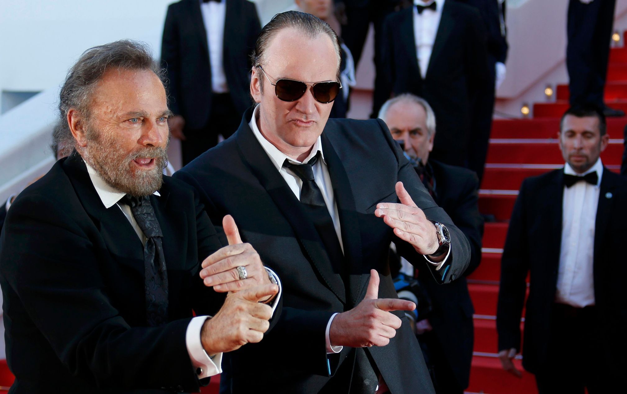 Director Quentin Tarantino and actor Franco Nero pose on the red carpet as they arrive at the closing ceremony of the 67th Cannes Film Festival in Cannes
