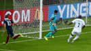 France's Karim Benzema (L) celebrates as Noel Valladares and Osman Chavez of Honduras (R) watch the ball enter the goal during their 2014 World Cup Group E soccer match a