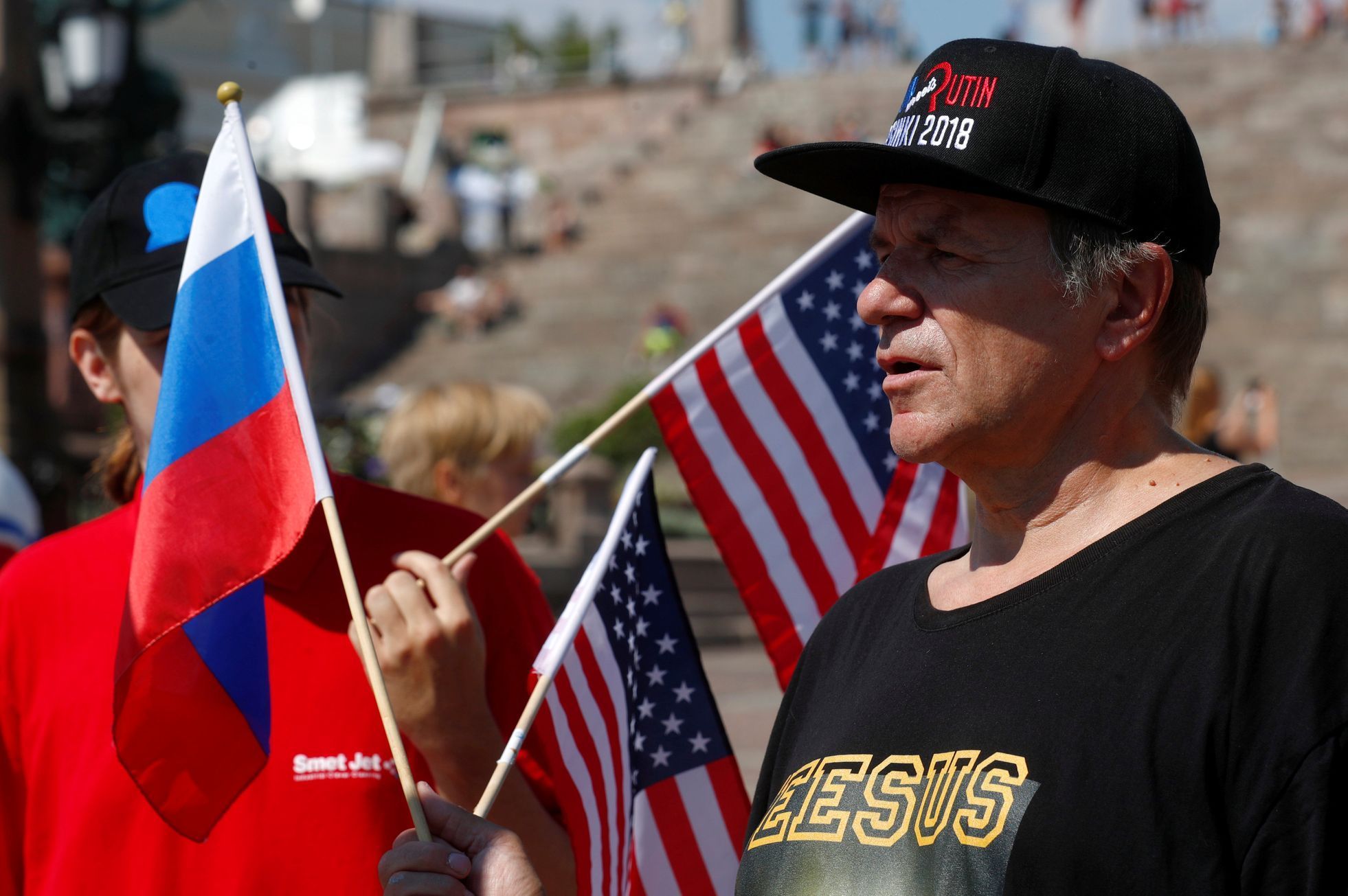 Lidé podporující Trumpa-summit amerického a ruského prezidenta Donalda Trumpa a Vladimira Putina
