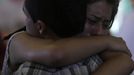 Relatives of victims of the fire at Boate Kiss nightclub react during a collective wake in the southern city of Santa Maria, 187 miles (301 km) west of the state capital Porto Alegre, January 27, 2013. The nightclub fire killed at least 232 people in Santa Maria early on Sunday when a band's pyrotechnics show set the building ablaze and fleeing partygoers stampeded toward blocked and overcrowded exits in the ensuing panic, officials said. REUTERS/Ricardo Moraes (BRAZIL - Tags: DISASTER OBITUARY) Published: Led. 27, 2013, 10:55 odp.