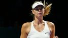 Maria Sharapova of Russia celebrates a point against Petra Kvitova of the Czech Republic during their WTA Finals singles tennis match at the Singapore Indoor Stadium Octo