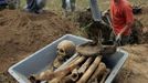 Russia - Remains - WWII - Battle for Stalingrad Russian staffers of the German war graves agency "Voksbund Deutscher Kriegsgraeberfuersorge" dig for the remains of soldiers killed in action during the WWII Battle for Stalingrad near Gumrak.