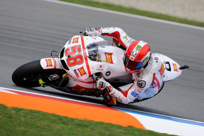 Motocyklový jezdec Marco Simoncelli z itálie na GP České republiky v Brně 2011.