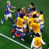 Japonci slaví gól v zápase MS 2022 Německo - Japonsko