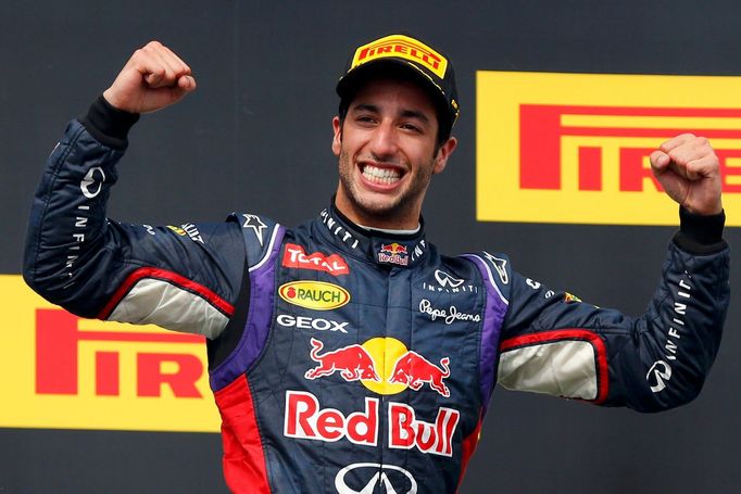 Red Bull Formula One driver Daniel Ricciardo of Australia celebrates after winning the Hungarian F1 Grand Prix at the Hungaroring circuit, near Budapest July 27, 2014. RE