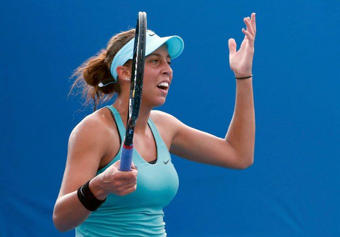 Madison Keys of the United States reacts during her women's singles match against Zheng Jie of China at the Australian Open 2014 tennis tournament in Melbourne January 15