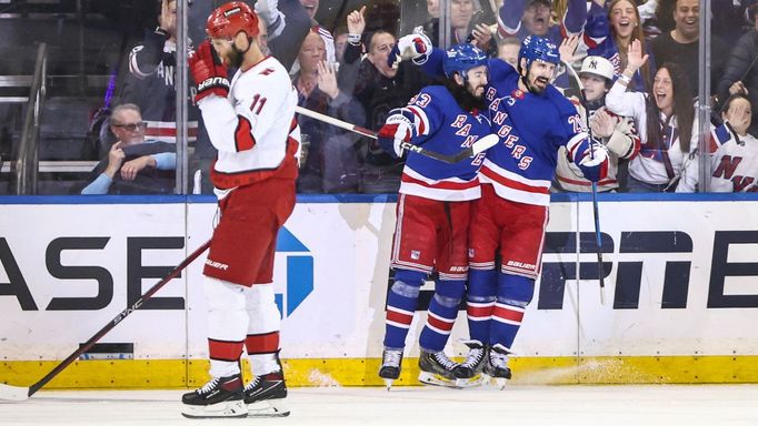 May 5, 2024; New York, New York, USA; New York Rangers center Mika Zibanejad (93) celebrates with New York Rangers left wing Chris Kreider (20) after scoring his second g