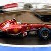 Ferrari Formula One driver Alonso exits pit during first pra