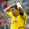 Football: Liverpool's Steven Gerrard looks dejected