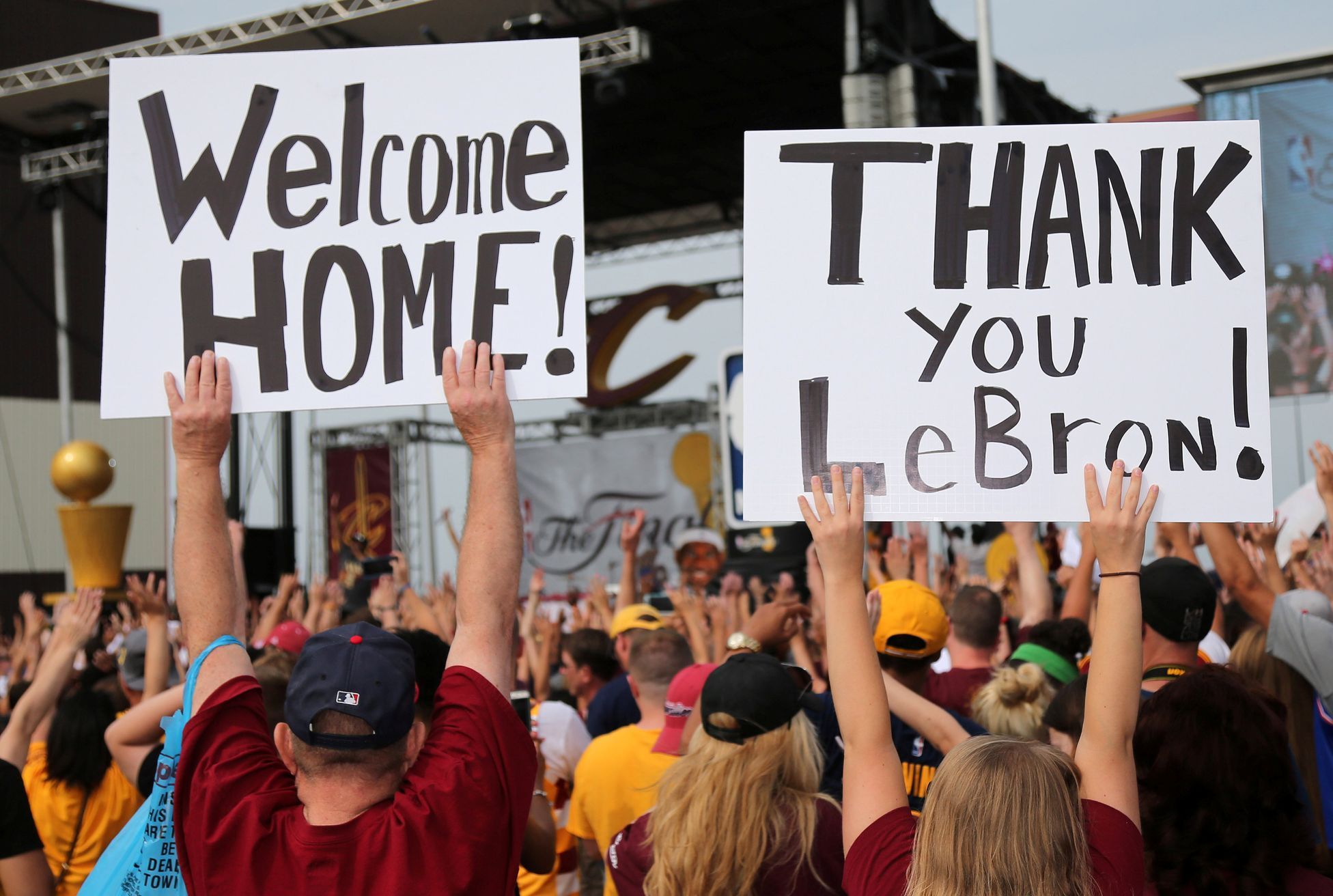 Cleveland Cavaliers fans celebrate and show their appreciation for LeBron James at a welcome party held at the airport in Cleveland