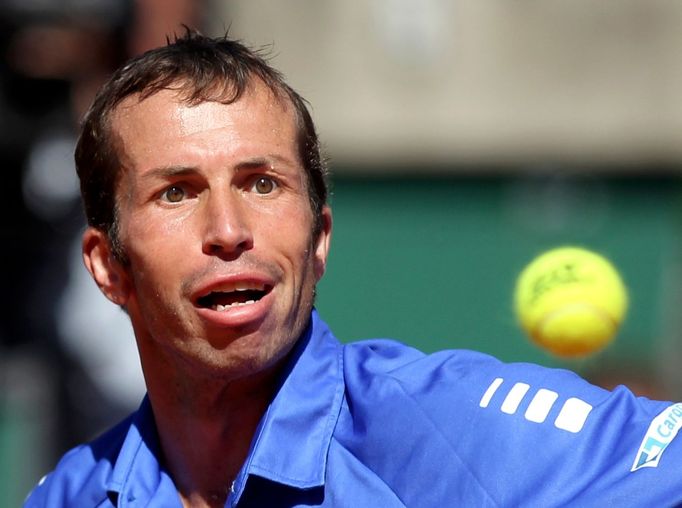 Český tenista Radek Štěpánek v prvním semifinálovém utkání Davis Cupu 2012 s Argentincem Juanem Martínem ael Potrem.