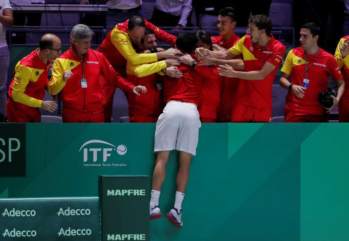 Tennis - Davis Cup Finals - Final - Caja Magica, Madrid, Spain - November 24, 2019   Spain's Roberto Bautista Agut celebrates with the team after winning his match agains