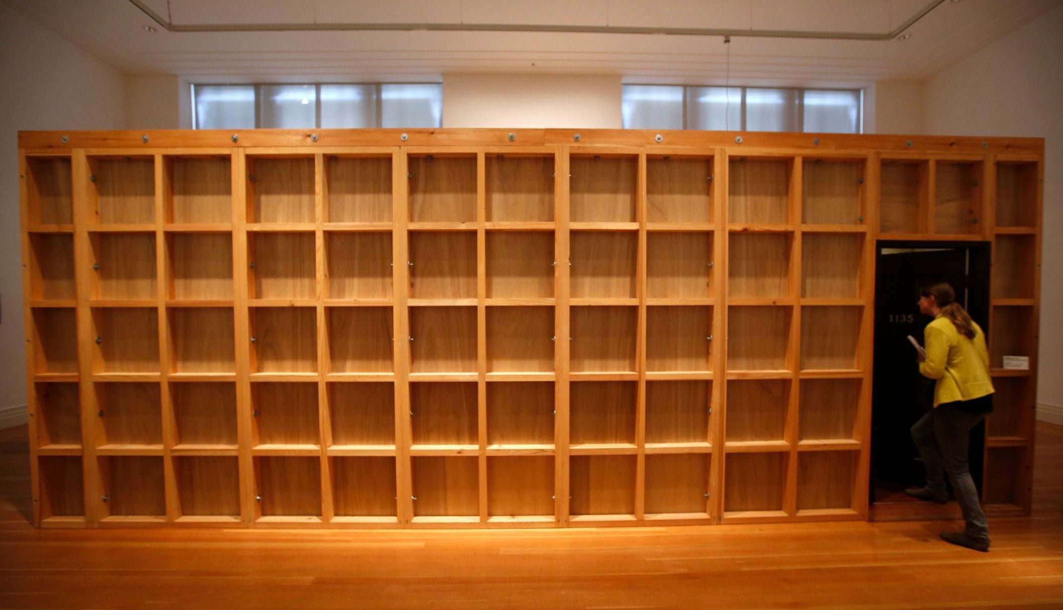 Woman enters installation &quot;81&quot; by Chinese artist Ai Weiwei during a media preview of the exhibition 'Evidence' at the Martin-Gropius Bau in Berlin