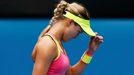 Eugenie Bouchard of Canada reacts after losing a point to Maria Sharapova of Russia during their women's singles quarter-final match at the Australian Open 2015 tennis to