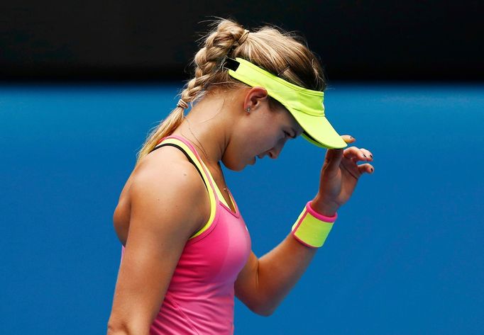 Eugenie Bouchard of Canada reacts after losing a point to Maria Sharapova of Russia during their women's singles quarter-final match at the Australian Open 2015 tennis to