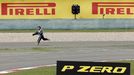 A race stuart collects debris during the Chinese Grand Prix.