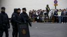 Spanish National Police officers stand guard outside the Santiago Bernabeu stadium before the 'Clasico' soccer match between Real Madrid and Barcelona in Madrid, Spain, N