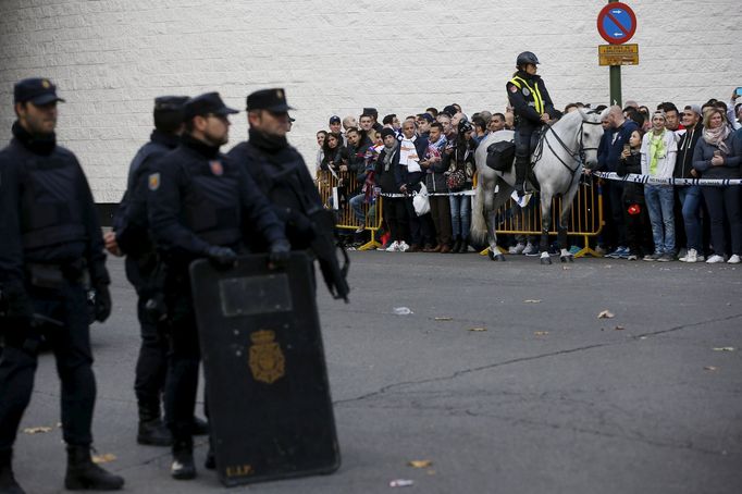 Spanish National Police officers stand guard outside the Santiago Bernabeu stadium before the 'Clasico' soccer match between Real Madrid and Barcelona in Madrid, Spain, N